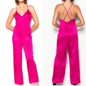 VS Fuchsia Open Leg Jumpsuit
New with tags. So cute.
